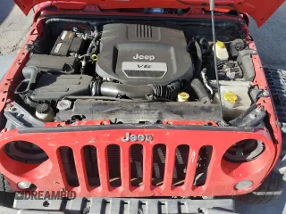 2015 Jeep Wrangler Unlimited Willys Wheeler with VIN 1C4BJWDG8FL574014, listed as a Copart auction lot 51921255 with 54,134 mi miles and Salvage Title. Bid and sale history available at DreamBid. Image 13.