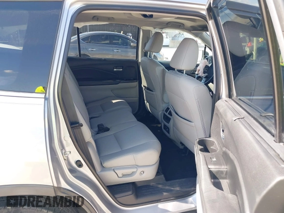 2020 Honda Pilot EX-L with VIN 5FNYF5H46LB004744, listed as a IAAI auction lot 42095298 with 76,159 mi miles and . Bid and sale history available at DreamBid. Image 8.