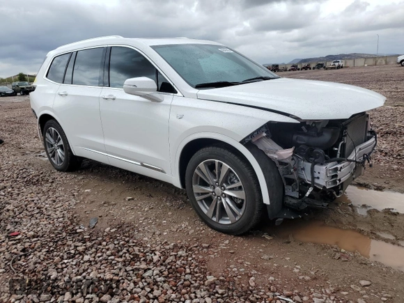 2022 Cadillac XT6 Premium Luxury with VIN 1GYKPCRS6NZ127584, listed as a Copart auction lot 48429085 with 24,994 mi miles and Salvage Title. Bid and sale history available at carsss.com. Image 4.