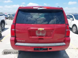 2015 Chevrolet Tahoe LS with VIN 1GNSCAEC4FR121571, listed as a IAAI auction lot 42499156 with 131,284 mi miles and . Bid and sale history available at DreamBid. Image 16.