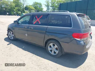 2010 Honda Odyssey Touring z VIN 5FNRL3H90AB085105, wystawiony jako IAAI lot #42142123 z przebiegiem Nie podano mil oraz . Historia ofert i sprzedaży dostępna na DreamBid. Obrazek 3.