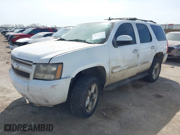 2007 Chevrolet Tahoe LTZ with VIN 1GNFC13007R139710, listed as a IAAI auction lot 41899509 with 215,004 mi miles and . Bid and sale history available at DreamBid. Image 2.