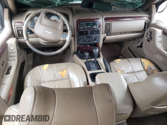 2001 Jeep Grand Cherokee Limited with VIN 1J4GW58S11C649736, listed as a Copart auction lot 66080214 with 199,584 mi miles and Salvage Title. Bid and sale history available at carsss.com. Image 8.