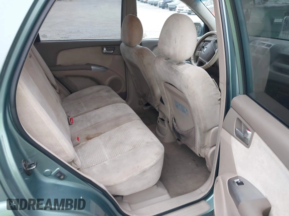 2005 Kia Sportage LX with VIN KNDJF723957038800, listed as a IAAI auction lot 41497596 with 122,189 mi miles and . Bid and sale history available at carsss.com. Image 8.