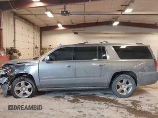 2019 Chevrolet Suburban Premier with VIN 1GNSKJKC1KR291629, listed as a IAAI auction lot 41565675 with 129,672 mi miles and . Bid and sale history available at DreamBid. Image 14.