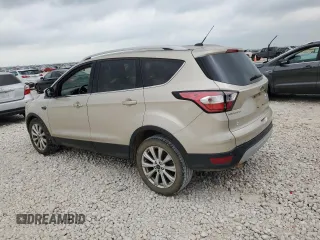 2017 Ford Escape Titanium with VIN 1FMCU0J95HUD40629, listed as a Copart auction lot 54982545 with 206,891 mi miles and Clean Title. Bid and sale history available at DreamBid. Image 2.
