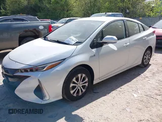 2022 Toyota Prius LE z VIN JTDKAMFP3N3202936, wystawiony jako IAAI lot #42238577 z przebiegiem 38 065 mil mil oraz . Historia ofert i sprzedaży dostępna na DreamBid. Obrazek 17.