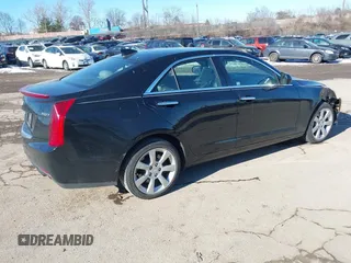 2016 Cadillac ATS Standard AWD z VIN 1G6AG5RX5G0103585, wystawiony jako IAAI lot #41439995 z przebiegiem 58 615 mil mil oraz . Historia ofert i sprzedaży dostępna na DreamBid. Obrazek 4.