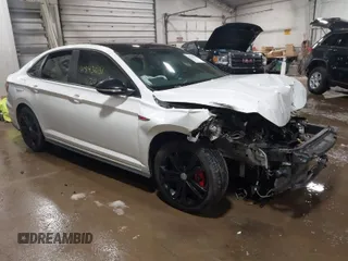 2020 Volkswagen Jetta GLI S with VIN 3VW6T7BUXLM039056, listed as a IAAI auction lot 41543631 with 63,173 mi miles and . Bid and sale history available at DreamBid. Image 1.