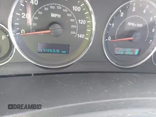 2007 Jeep Grand Cherokee Laredo with VIN 1J8GR48K57C618529, listed as a IAAI auction lot 42139566 with 174,559 mi miles. Bid and sale history available at carsss.com. Image 7.