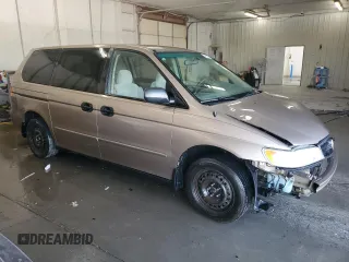 2004 Honda Odyssey LX z VIN 5FNRL18554B007005, wystawiony jako Copart lot #54377345 z przebiegiem 219 655 mil mil oraz Szkoda całkowita • Salvage title. Historia ofert i sprzedaży dostępna na DreamBid. Obrazek 4.