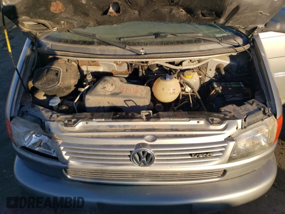 2000 Volkswagen EuroVan с VIN WV2MH4700YH083922, выставлен на аукционе Copart как лот 44274825 с пробегом 159 931 миль миль и Чистый • Clean title. История ставок и продаж доступна на DreamBid. Изображение 12.