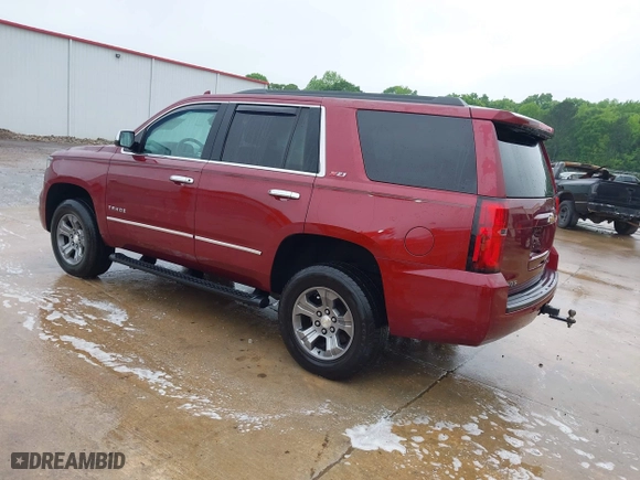 2017 Chevrolet Tahoe LT with VIN 1GNSKBKCXHR270034, listed as a IAAI auction lot 42036132 with 144,530 mi miles. Bid and sale history available at carsss.com. Image 3.