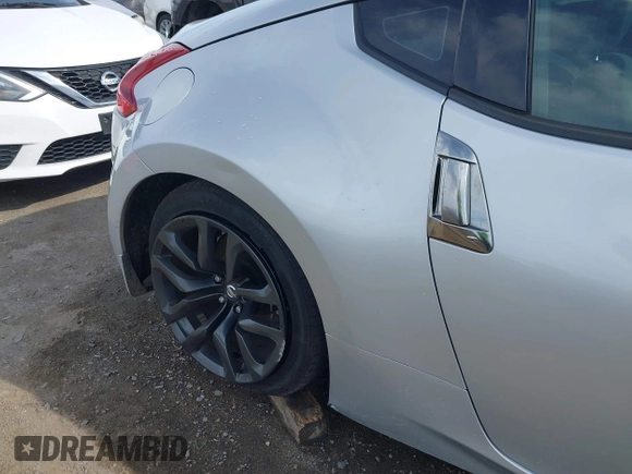 2018 Nissan 370Z Sport with VIN JN1AZ4EH7JM572602, listed as a IAAI auction lot 41902662 with 76,262 mi miles and . Bid and sale history available at DreamBid. Image 6.