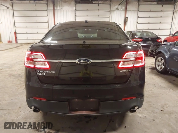 2015 Ford Taurus SE with VIN 1FAHP2D81FG159514, listed as a IAAI auction lot 41641336 with 110,137 mi miles and . Bid and sale history available at carsss.com. Image 17.