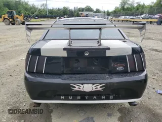 1999 Ford Mustang with VIN 1FAFP4040XF146055, listed as a Copart auction lot 55977035 with Not provided miles and Salvage title. Bid and sale history available at DreamBid. Image 6.