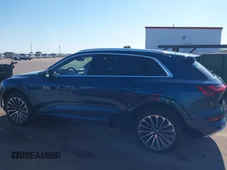 2019 Audi e-tron Prestige with VIN WA1VABGE0KB009718, listed as a IAAI auction lot 42336983 with 54,871 mi miles and . Bid and sale history available at DreamBid. Image 15.