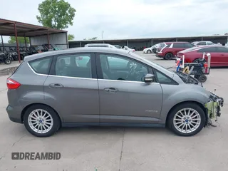 2013 Ford C-Max SEL z VIN 1FADP5BUXDL526768, wystawiony jako IAAI lot #42357018 z przebiegiem 149 659 mil mil oraz . Historia ofert i sprzedaży dostępna na DreamBid. Obrazek 14.