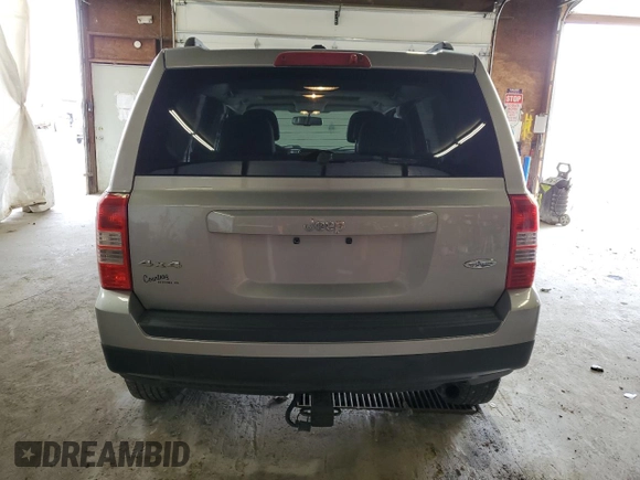 2015 Jeep Patriot High Altitude with VIN 1C4NJRFB4FD370708, listed as a Copart auction lot 51512525 with 136,743 mi miles and Salvage Title. Bid and sale history available at carsss.com. Image 6.