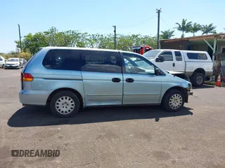 2003 Honda Odyssey LX z VIN 5FNRL18513B153917, wystawiony jako IAAI lot #41914791 z przebiegiem Nie podano mil oraz . Historia ofert i sprzedaży dostępna na DreamBid. Obrazek 14.