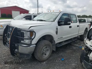 2018 Ford F-350 XL with VIN 1FT8W3BT3JEC37855, listed as a Copart auction lot 63740775 with 128,675 mi miles and Salvage title. Bid and sale history available at DreamBid. Image 1.