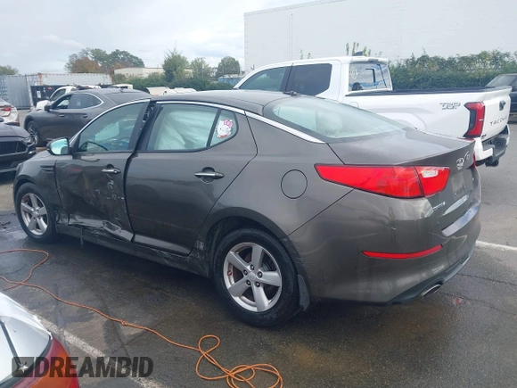 2015 Kia Optima LX with VIN 5XXGM4A72FG400848, listed as a IAAI auction lot 40802198 with 173,270 mi miles and . Bid and sale history available at DreamBid. Image 15.