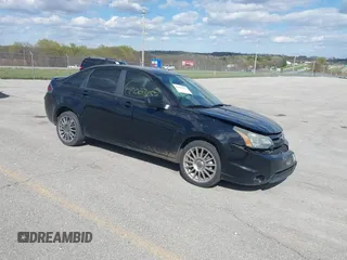 2010 Ford Focus SES with VIN 1FAHP3GN7AW291389, listed as a IAAI auction lot 42003153 with 151,987 mi miles. Bid and sale history available at carsss.com. Image 1.