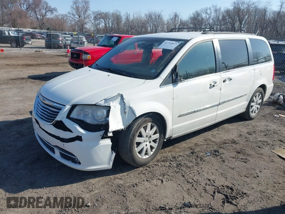 2013 Chrysler Town & Country Touring with VIN 2C4RC1BG8DR573559, listed as a IAAI auction lot 41793874 with 205,005 mi miles. Bid and sale history available at carsss.com. Image 2.