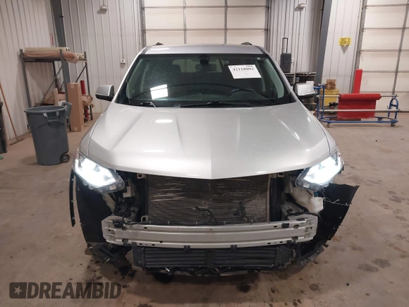 2018 Chevrolet Traverse LT Cloth z VIN 1GNEVGKW9JJ144070, wystawiony jako IAAI lot #42118002 z przebiegiem 142 006 mil mil oraz . Historia ofert i sprzedaży dostępna na DreamBid. Obrazek 13.