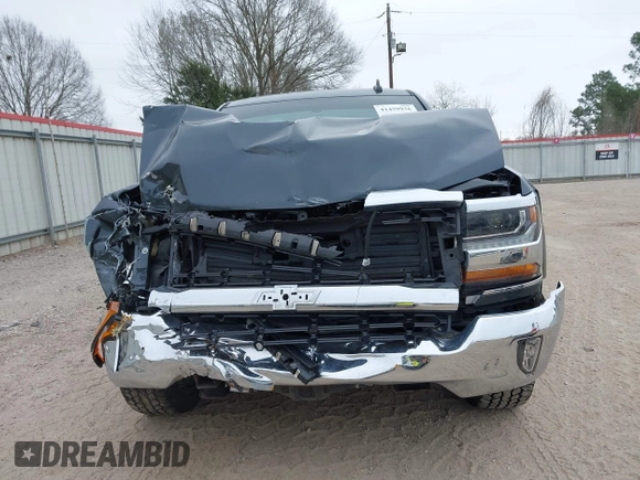 2018 Chevrolet Silverado 1500 LT with VIN 3GCPCREC1JG497019, listed as a IAAI auction lot 41459936 with 52,691 mi miles and . Bid and sale history available at DreamBid. Image 12.