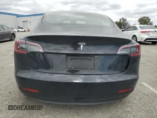2023 Tesla Model 3 z VIN 5YJ3E1EA7PF600239, wystawiony jako Copart lot #56557705 z przebiegiem 18 851 mil mil oraz Szkoda całkowita • Salvage title. Historia ofert i sprzedaży dostępna na DreamBid. Obrazek 6.