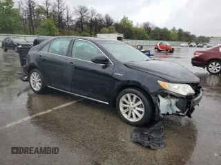 2012 Toyota Camry XLE z VIN 4T1BD1FK8CU001921, wystawiony jako Copart lot #57861715 z przebiegiem Nie podano mil oraz Szkoda całkowita • Salvage title. Historia ofert i sprzedaży dostępna na DreamBid. Obrazek 4.
