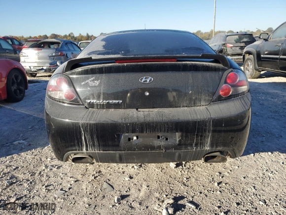 2008 Hyundai Tiburon GS with VIN KMHHM66DX8U291983, listed as a Copart auction lot 74586874 with 111,572 mi miles and Salvage Title. Bid and sale history available at carsss.com. Image 6.
