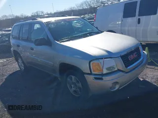 2004 GMC Envoy SLE with VIN 1GKDS13S942364463, listed as a IAAI auction lot 41658640 with 257,138 mi miles. Bid and sale history available at carsss.com. Image 1.