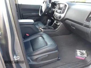 2021 GMC Canyon 2WD Elevation with VIN 1GTG5CEN6M1293098, listed as a IAAI auction lot 41477792 with 48,252 mi miles. Bid and sale history available at carsss.com. Image 5.