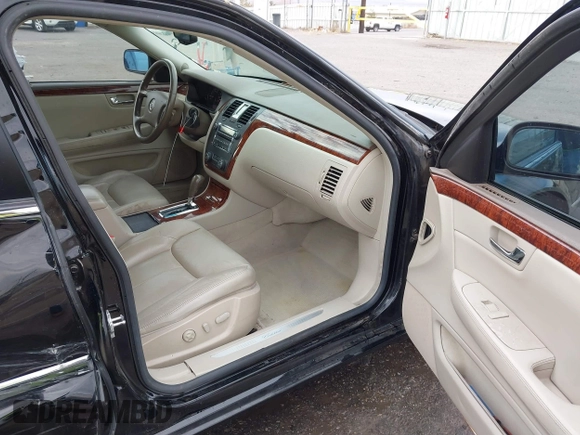 2006 Cadillac DTS w/1SC with VIN 1G6KD57Y96U251691, listed as a IAAI auction lot 41086147 with 128,959 mi miles. Bid and sale history available at carsss.com. Image 5.