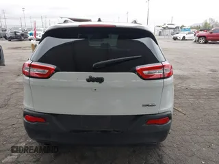 2015 Jeep Cherokee Latitude with VIN 1C4PJLCB5FW642701, listed as a IAAI auction lot 42063262 with 142,501 mi miles and . Bid and sale history available at carsss.com. Image 16.