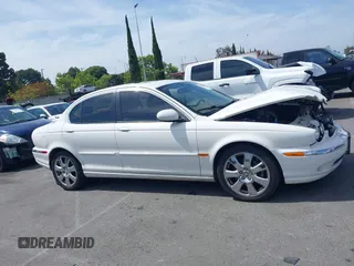 2006 Jaguar X-Type z VIN SAJWA51A76WE86537, wystawiony jako IAAI lot #42287581 z przebiegiem Nie podano mil oraz . Historia ofert i sprzedaży dostępna na DreamBid. Obrazek 13.