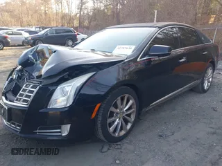 2013 Cadillac XTS Premium z VIN 2G61S5S38D9199459, wystawiony jako IAAI lot #41787638 z przebiegiem 171 298 mil mil oraz . Historia ofert i sprzedaży dostępna na DreamBid. Obrazek 17.