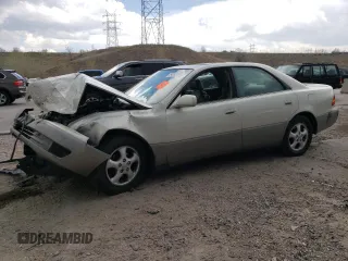 1999 Lexus ES 300 с VIN JT8BF28G3X5063996, выставлен на аукционе Copart как лот 54093095 с пробегом 216 576 миль миль и Списание • Salvage title. История ставок и продаж доступна на DreamBid. Изображение 1.