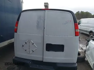 2010 GMC Savana Cargo Van with VIN 1GTZGFBA5A1161399, listed as a IAAI auction lot 41486439 with 158,956 mi miles. Bid and sale history available at carsss.com. Image 15.