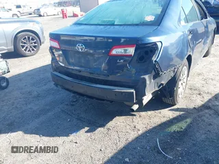 2014 Toyota Camry L with VIN 4T1BF1FK3EU820882, listed as a IAAI auction lot 42012278 with 174,000 mi miles and . Bid and sale history available at DreamBid. Image 6.