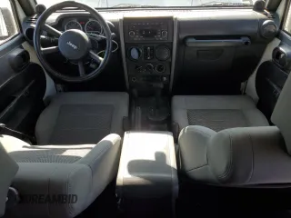 2009 Jeep Wrangler Unlimited Rubicon with VIN 1J8GA69149L767218, listed as a Copart auction lot 59342825 with 157,307 mi miles and Salvage title. Bid and sale history available at DreamBid. Image 8.