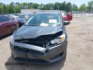2018 Ford Focus SE with VIN 1FADP3FE2JL227679, listed as a IAAI auction lot 42296608 with 128,269 mi miles and . Bid and sale history available at DreamBid. Image 12.
