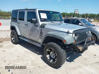 2007 Jeep Wrangler Unlimited X with VIN 1J4GB39177L199377, listed as a IAAI auction lot 42011608 with 82,083 mi miles and . Bid and sale history available at DreamBid. Image 1.