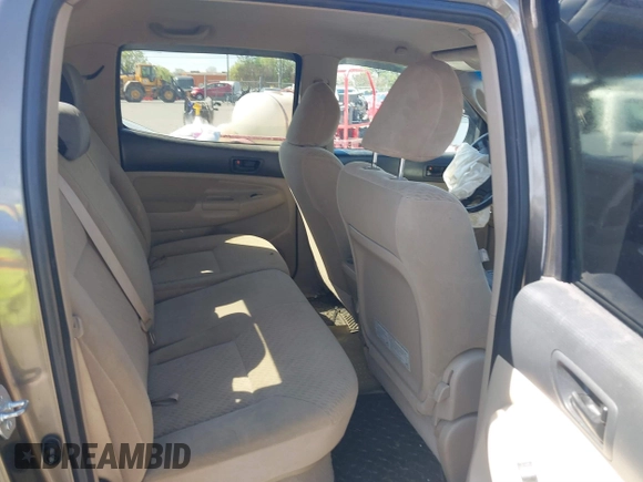 2009 Toyota Tacoma with VIN 3TMLU42N19M024223, listed as a IAAI auction lot 41833027 with 182,206 mi miles and . Bid and sale history available at DreamBid. Image 8.