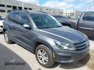 2015 Volkswagen Tiguan SEL with VIN WVGAV7AX7FW607265, listed as a IAAI auction lot 42585648 with 163,172 mi miles and . Bid and sale history available at DreamBid. Image 1.