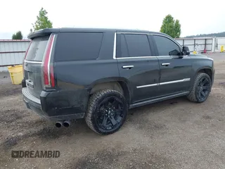 2017 Cadillac Escalade Premium Luxury z VIN 1GYS4CKJ0HR271498, wystawiony jako IAAI lot #42349511 z przebiegiem 52 338 mil mil oraz . Historia ofert i sprzedaży dostępna na DreamBid. Obrazek 4.