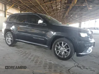 2014 Jeep Grand Cherokee с VIN 1C4RJEJM8EC424373, выставлен на аукционе Copart как лот 72256674 с пробегом 128 998 миль миль и Списание • Salvage title. История ставок и продаж доступна на DreamBid. Изображение 4.