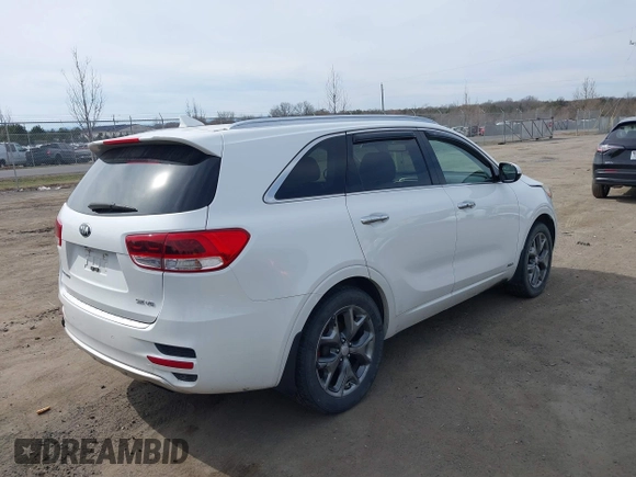 2016 Kia Sorento SX z VIN 5XYPKDA54GG101802, wystawiony jako IAAI lot #41784161 z przebiegiem 99 162 mil mil oraz . Historia ofert i sprzedaży dostępna na DreamBid. Obrazek 4.